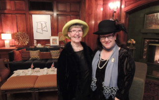 Barbara Ross and Mary Cabrian dressed in post-Edwardian attire.