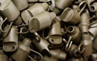 Photo of injection molded plastic parts manufactured at the Lighthouse