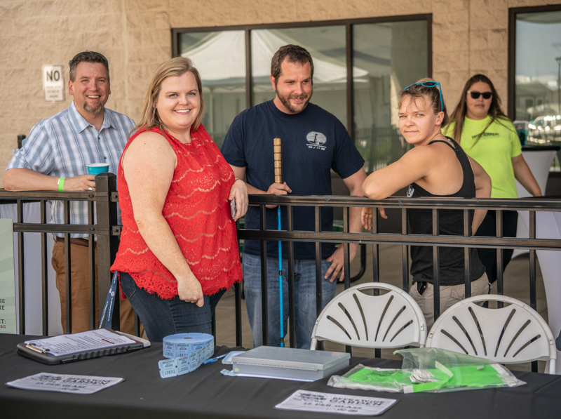 LHFTR2018-6 Lighthouse staff smiling at the registration table
