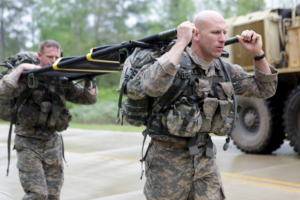 U.S. Army soldiers carrying a rigid litter during a training exercise (credit: dvidshub.net)