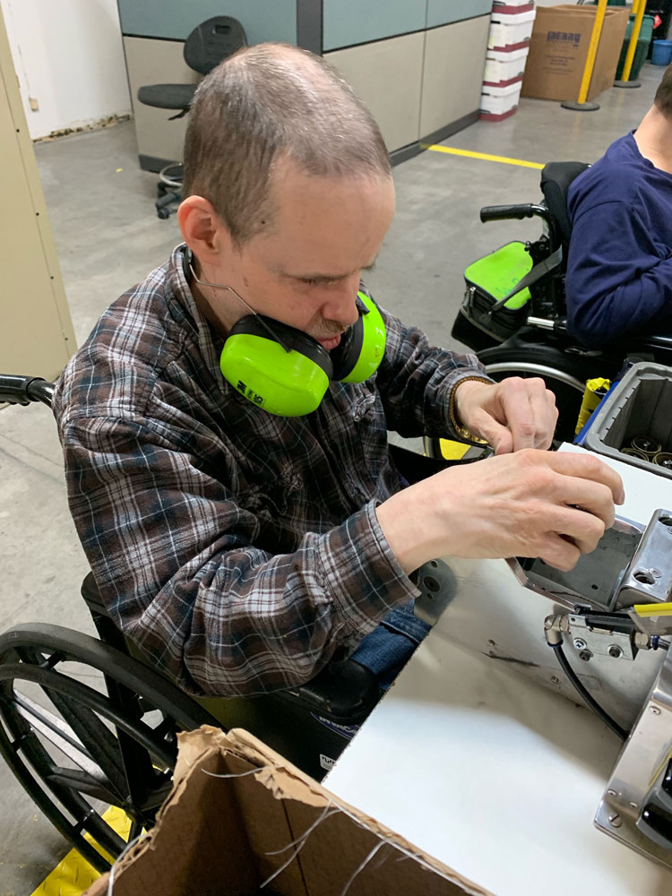 Tom-Miller-Working Tom Miller working in production