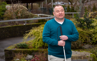 Portrait of Shawn Dobbs in a garden