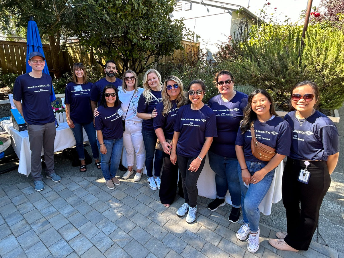 Volunteers from Bank of America pose for a group photo in the Fragrant Garden